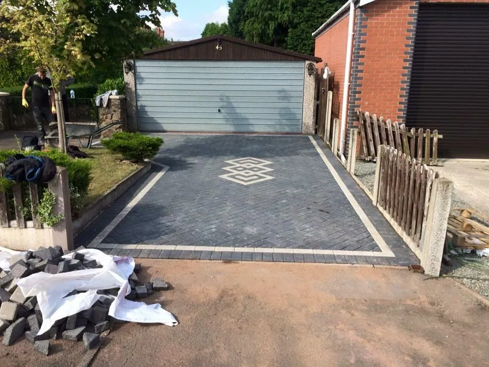 Grey charcoal block paving on a driveway