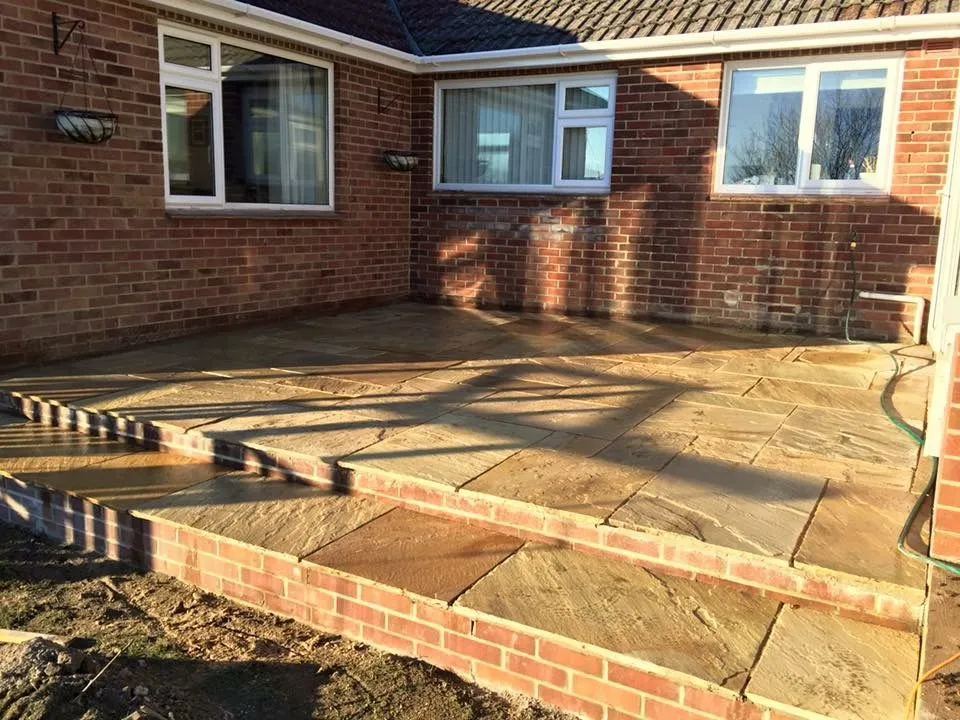 Extended paved patio in the garden
