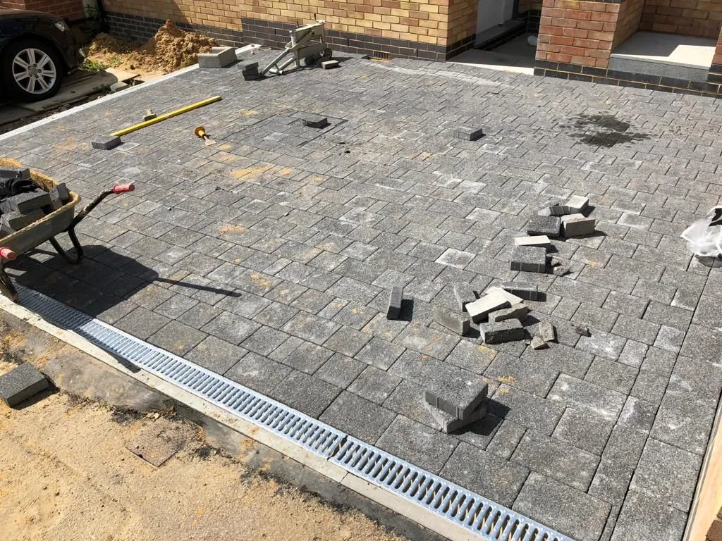 Rear garden patio with paving installation